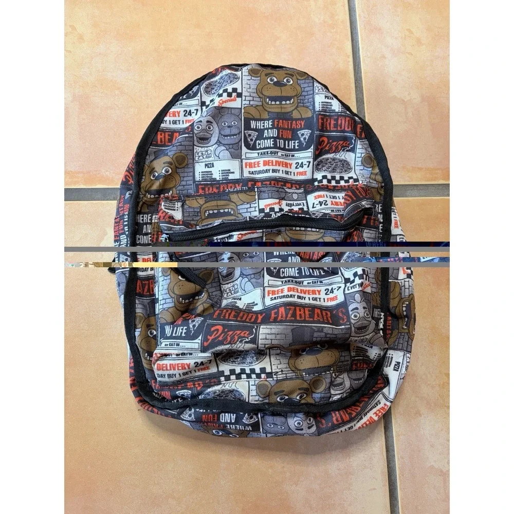 Five Nights at Freddy reversible backpack - Fred Bear / Freddy Fazbears Pizza